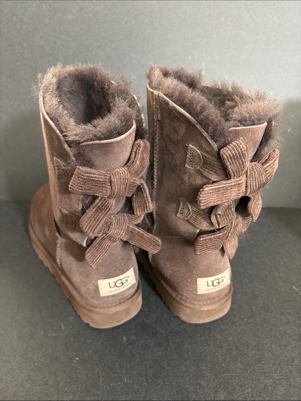 Ugg chocolate color with corduroy Bailey bow size 9